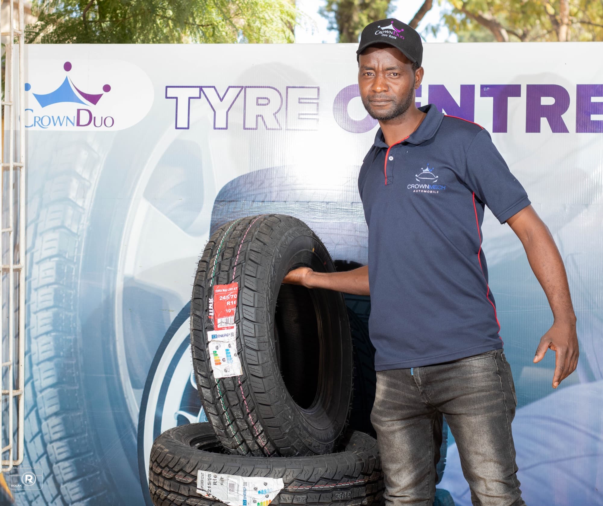 A Crown Duo technician with new tyres at the Tyre Centre